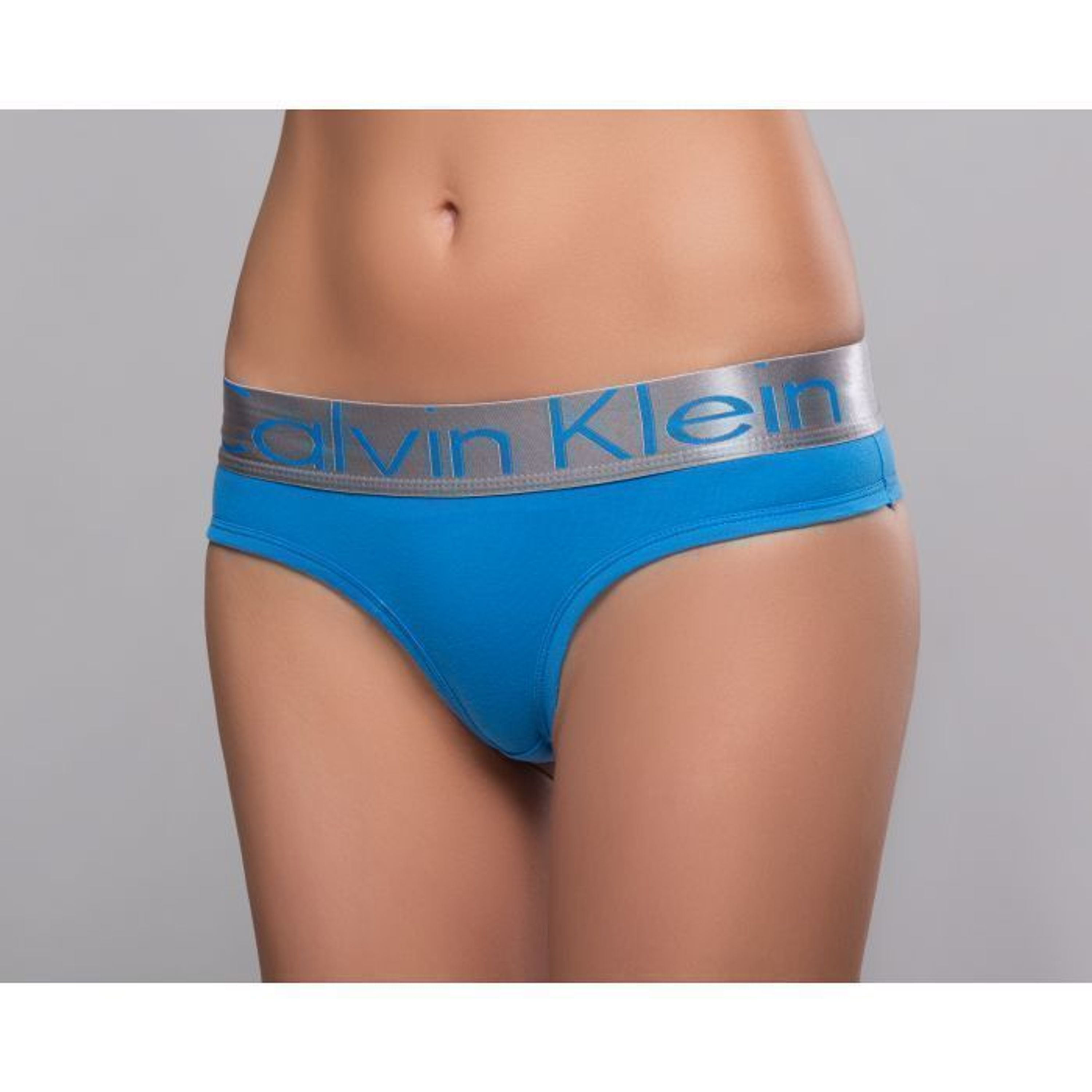 Женские трусы стринги бирюзовые Calvin Klein Women String Tourquoise фото 1
