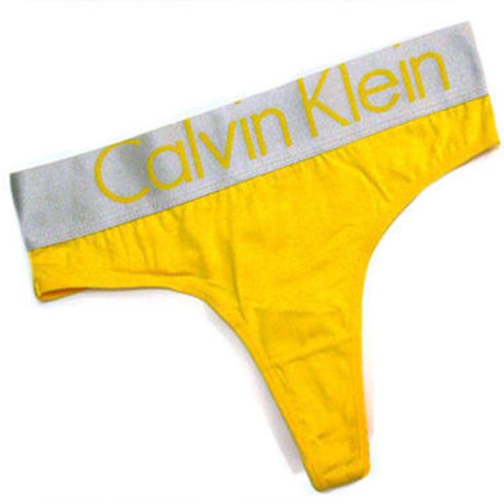  Женские трусы стринги стальной пояс Calvin Klein Women String Yellow фото 2