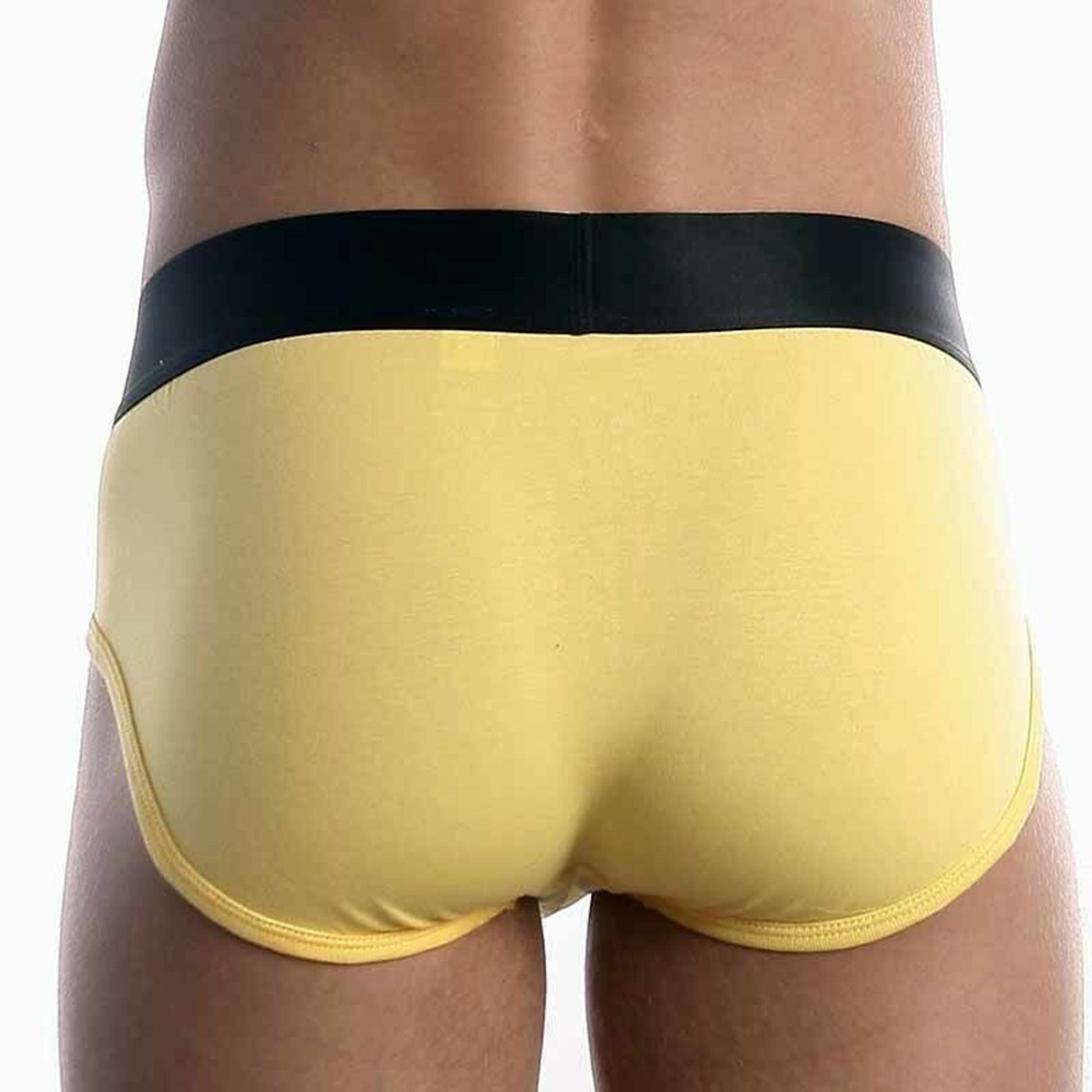 Мужские трусы брифы жёлтые с чёрной резинкой и жёлтыми буквами Calvin Klein Steel Black Waistband Yellow модал фото 4