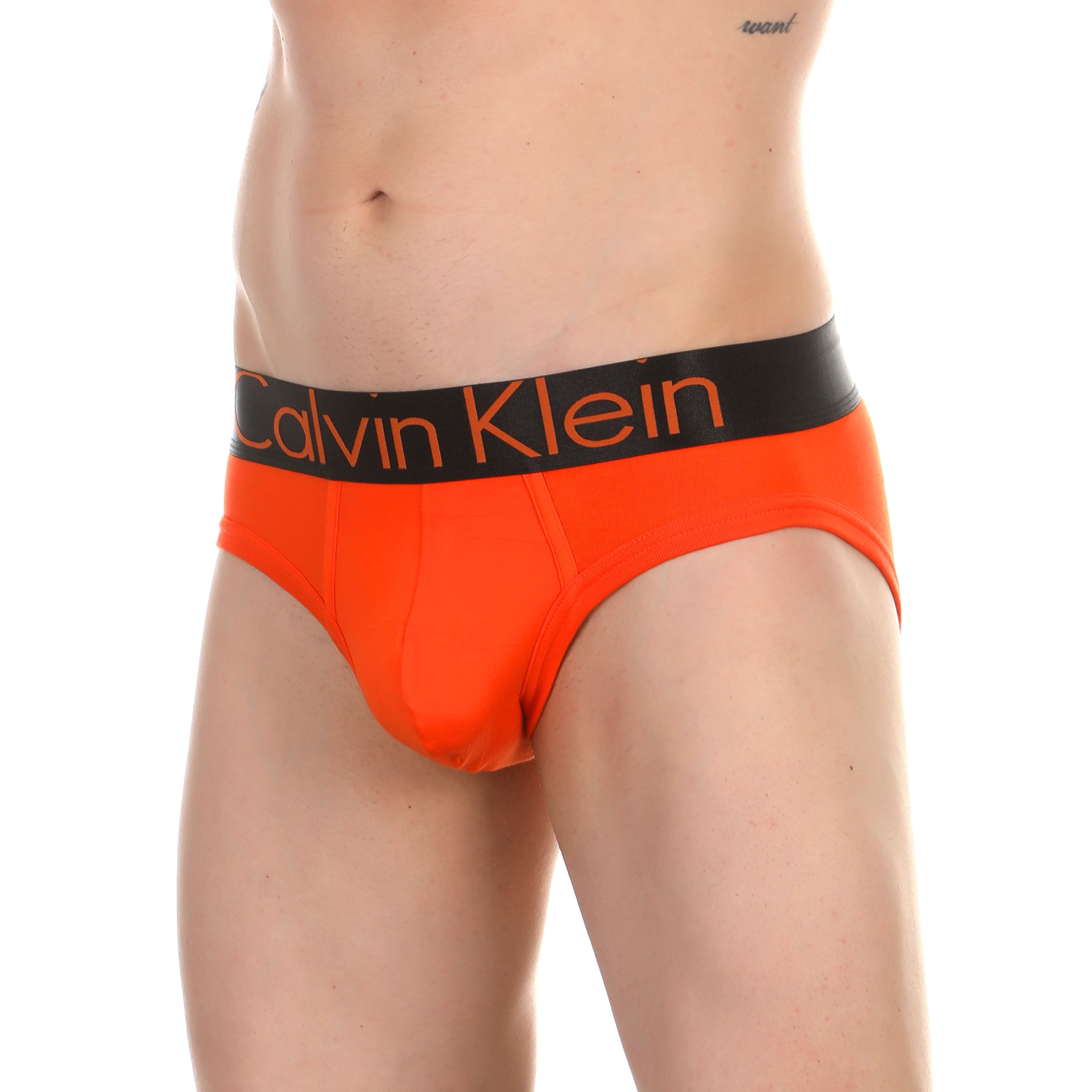 Мужские трусы брифы оранжевые Calvin Klein фото 1