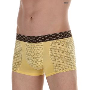 Фото Мужские трусы боксеры желтые Gucci