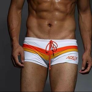 Фото Мужские плавки белые с оранжевой вставкой AQUX 6520