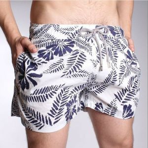 Фото Мужские шорты пляжные белые с синими цветами Vilebrequin Shorts