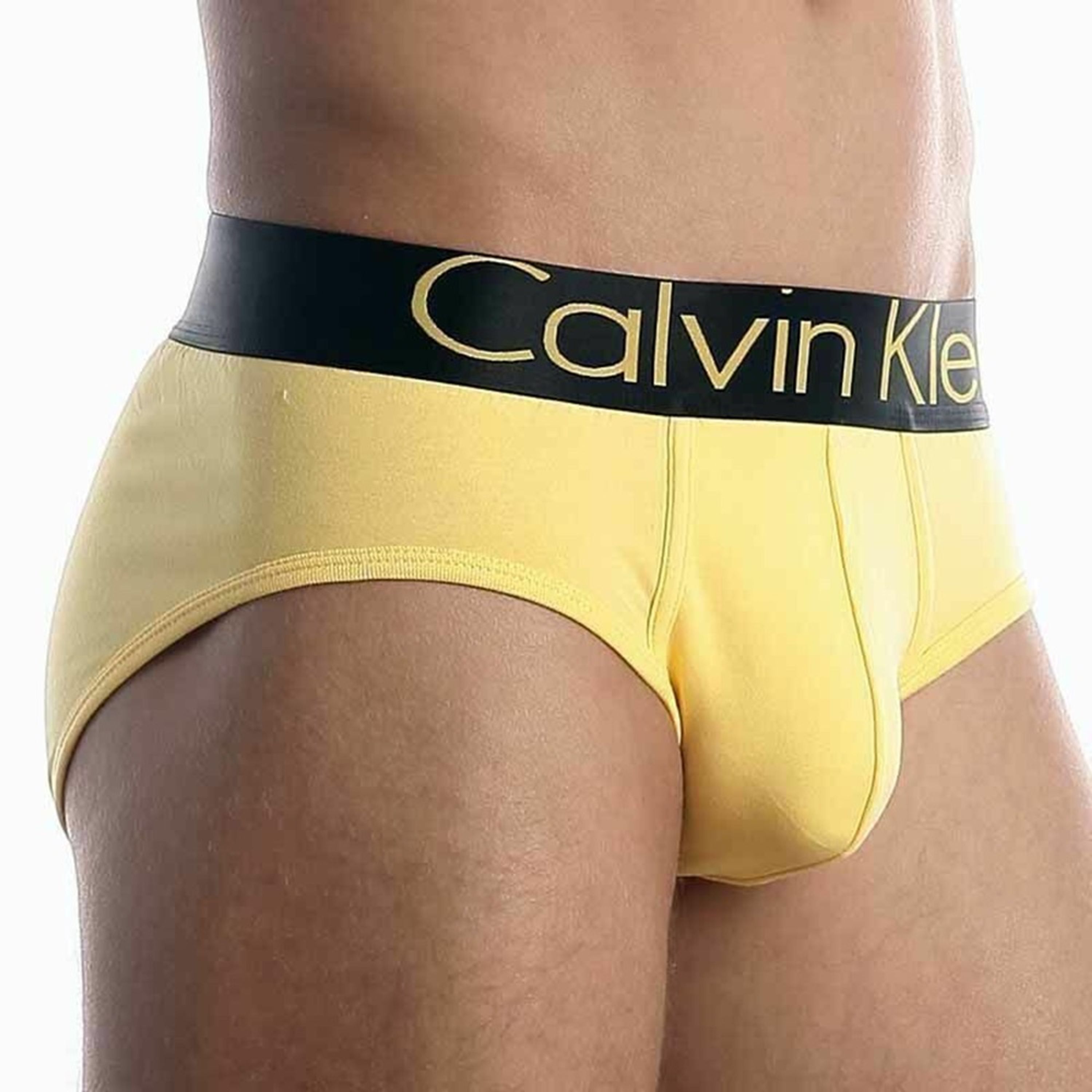 Мужские трусы брифы жёлтые с чёрной резинкой и жёлтыми буквами Calvin Klein Steel Black Waistband Yellow модал фото 3