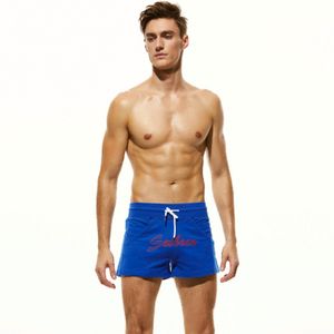 Фото Мужские пляжные шорты синие с надписью SEOBEAN