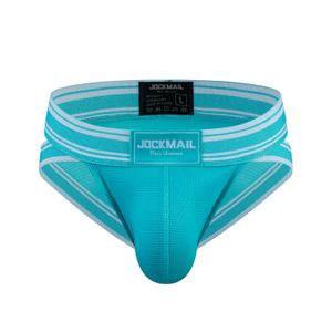 Фото Мужские трусы брифы бирюзовые с вырезами по бокам JOCKMAIL JM2024-11