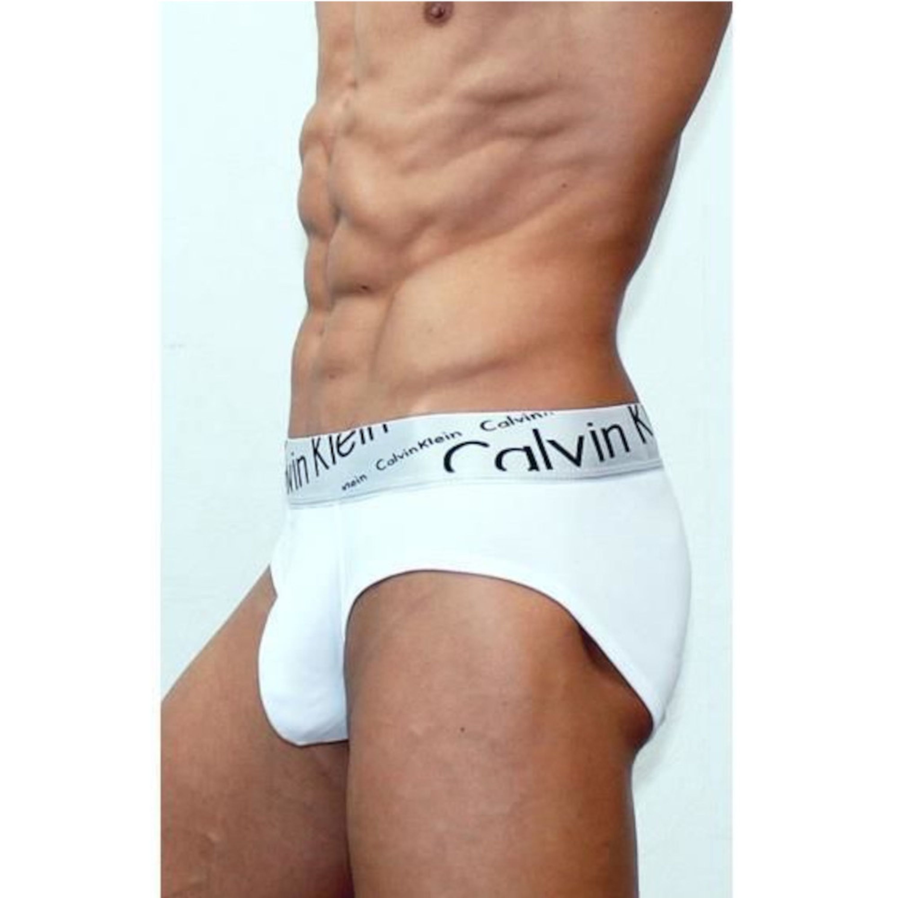 Мужские трусы брифы белые с косой резинкой Calvin Klein Steel Italics White фото 2