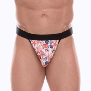 Фото Мужские трусы тонги белые с разноцветным принтом Don Moris DM072293