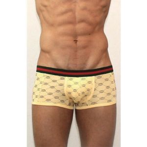 Фото Мужские трусы хипсы желтые с овалами Yellow Trunks