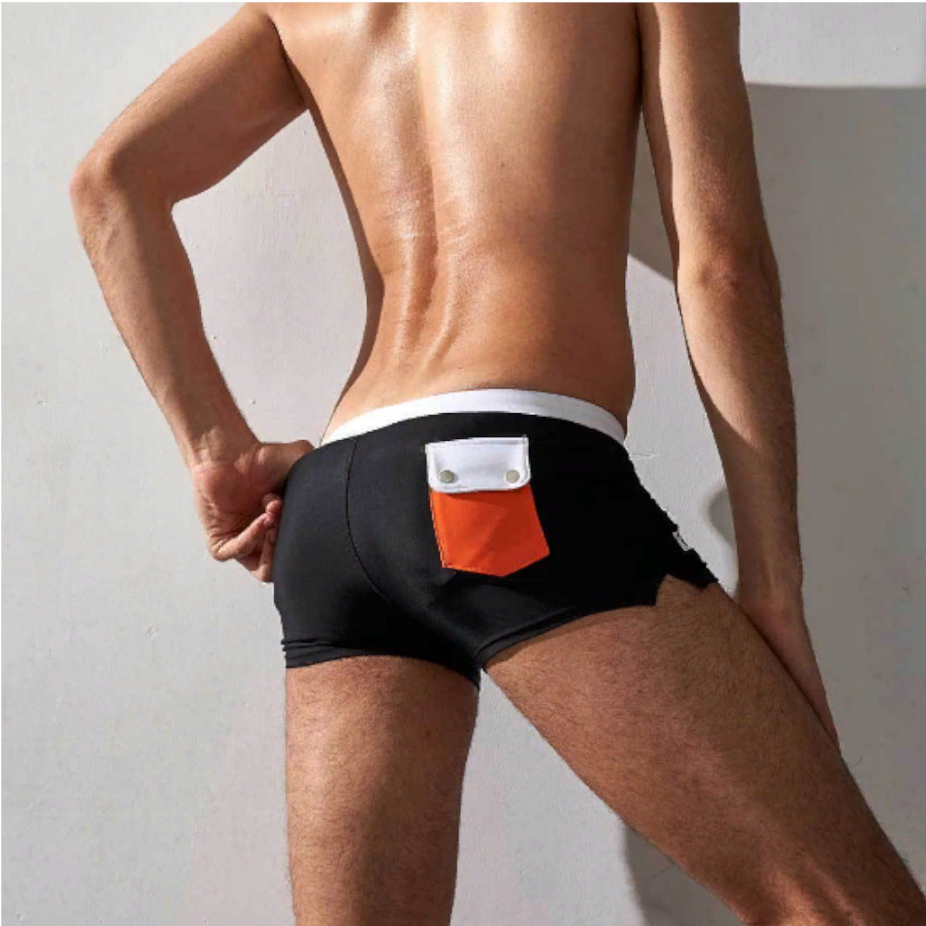 Мужские плавки черные с белой резинкой оранжевым карманом сзади Aqux фото 2