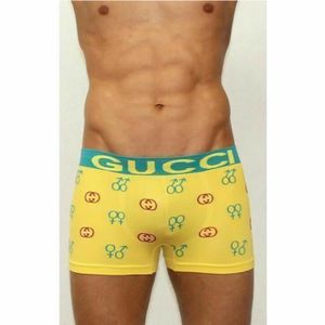 Фото Мужские трусы боксеры бесшовные Gucci желтые с принтом