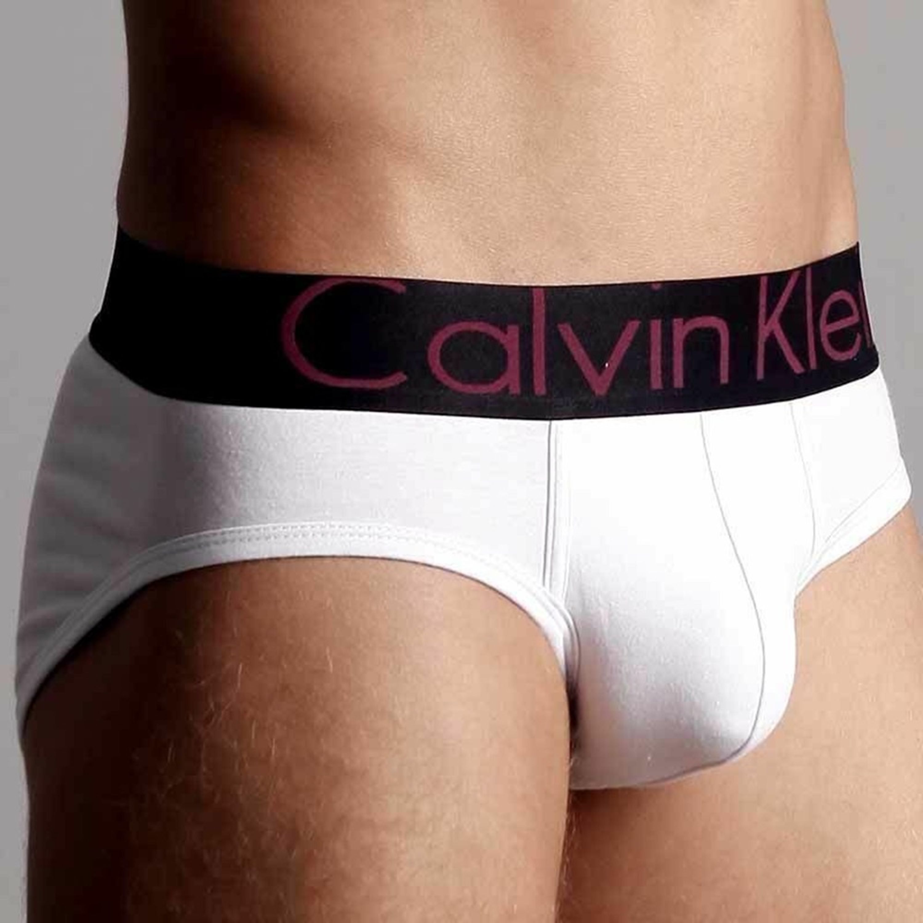 Мужские трусы брифы белые с черной резинкой Calvin Klein фото 3